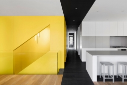 Naturehumaine adds sculptural black and yellow staircase to historic Montreal home